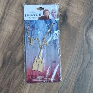 Disney Frozen II Gold Castle Necklace. NWT